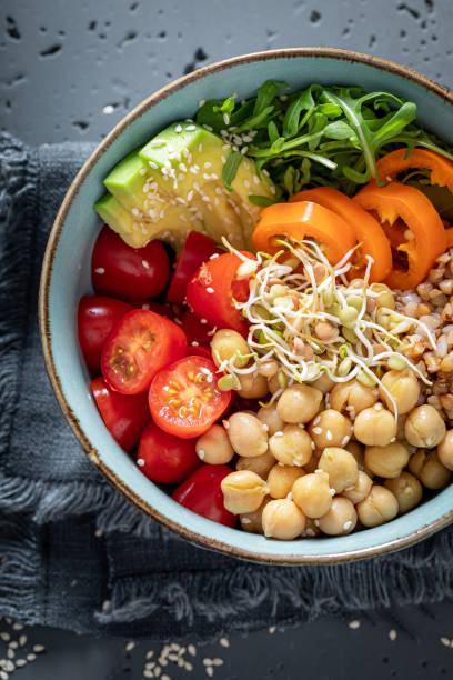 istock Diet salad with groats, chickpeas, arugula and vegetables. 1406488798
