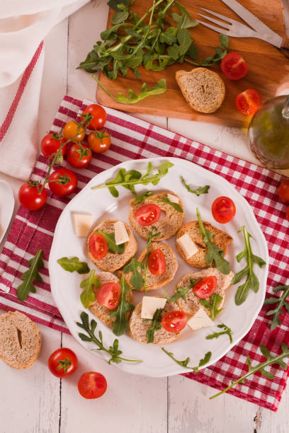 istock Friselle with cherry tomatoes and arugula. 1406491632