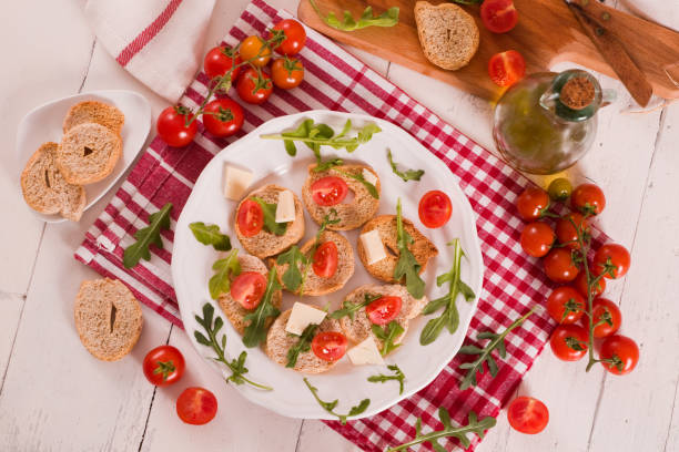 istock Friselle with cherry tomatoes and arugula. 1406493525