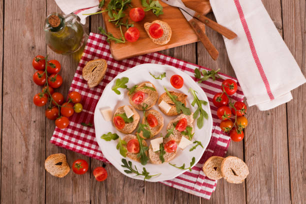 istock Friselle with cherry tomatoes and arugula. 1406493833