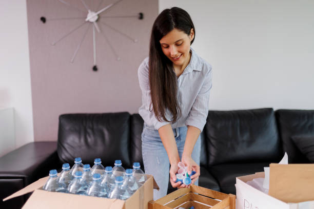 istock Young woman recycling garbage. Sustainability concept 1406494075