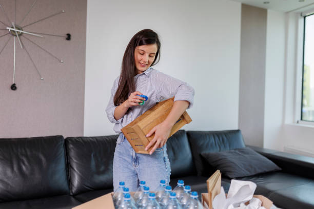 istock Young woman recycling garbage. Sustainability concept 1406494198