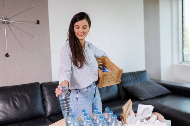 istock Young woman recycling garbage. Sustainability concept 1406494972