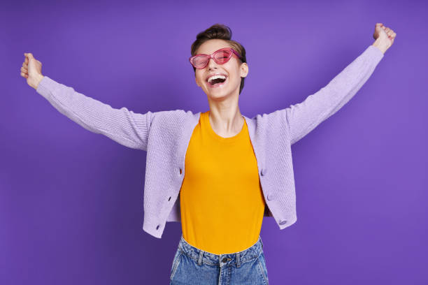 istock Happy young woman keeping arms outstretched 1406494995