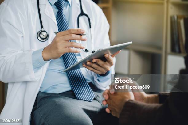 Psychiatrist Or Professional Psychologist Counseling Or Therapy Session To Male Patients Suffering From Mental Health Problems Due To Economic Failure After The Covid19 Pandemic Ptsd Mental Health Stock Photo - Download Image Now