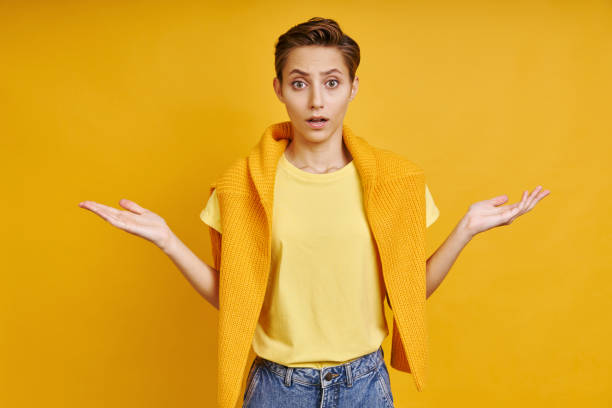 istock Surprised young woman keeping arms outstretched 1406496719