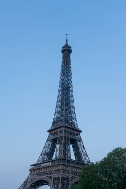 istock Part of the Eiffel Tower in Paris with the blue sky 1406497560