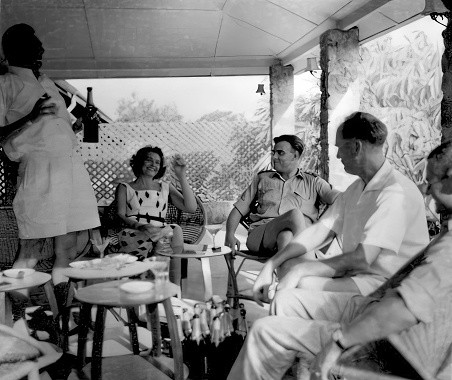 Accra, Burma - June 1958: People relaxing in the Officers Mess in Burma Camp, Accra, Ghana, circa 1958