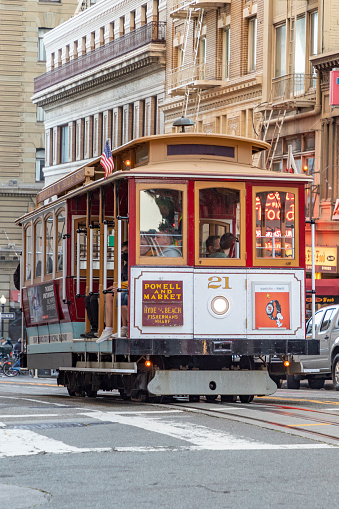 San Francisco, USA - May 24, 2022: historic  Cable Car Powell Hyde Line on turntable at Powell Street terminal at Market Street in downtown San Francisco, California CA, USA.