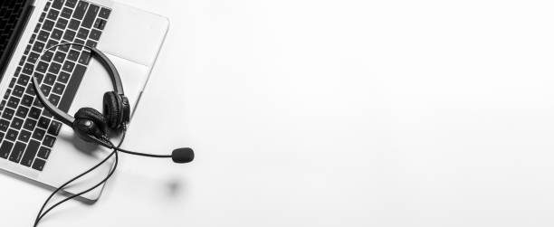 istock Headset and customer support equipment at call center ready for actively service , Communication support, call center and customer service help desk.for (call center) concept . 1406498618