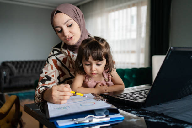 istock Middle Eastern Mother working from home with kid 1406498879