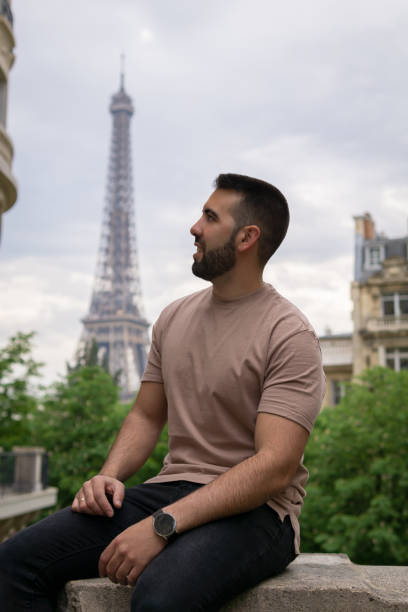 istock Young boy in the foreground with the eiffel tower in the background 1406499974