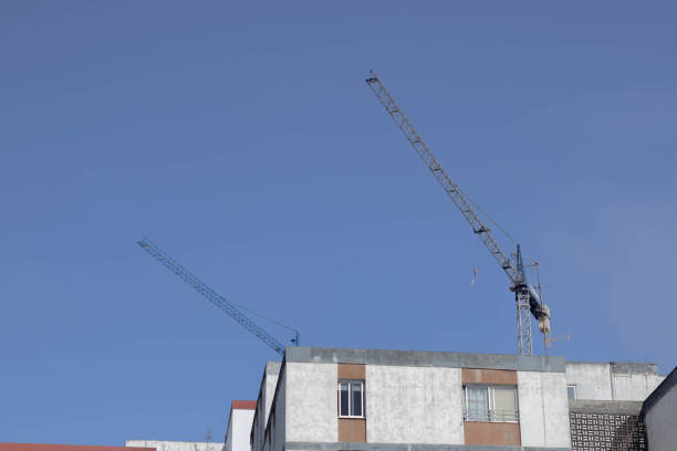 istock Cranes of a building under construction. 1406503859