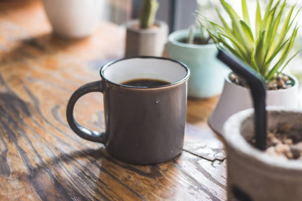 istock Cup of coffee on the table in the restaurant. 1406505021