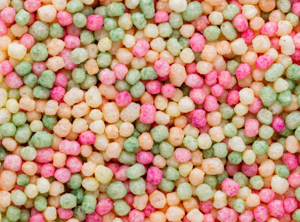 istock Thousands sprinkles tiny sugar beads for decorating cakes and desserts background. 1406507593