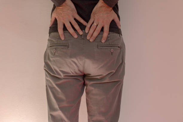 istock Middle aged man with pain in his back 1406508705