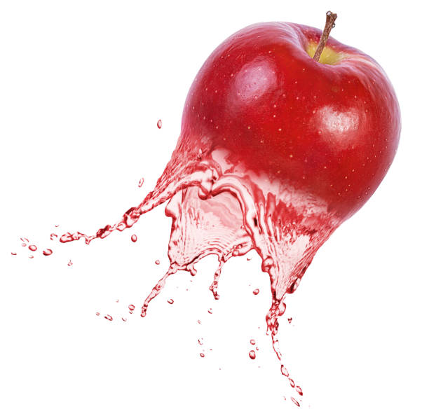 istock Fresh ripe apple, apple and juice . Tasty red apple fruit juice splashing 1406508792