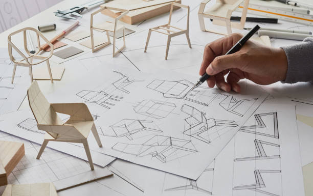 istock Designer sketching drawing design development product plan draft chair armchair Wingback Interior furniture prototype manufacturing production. designer studio concept . 1406509392