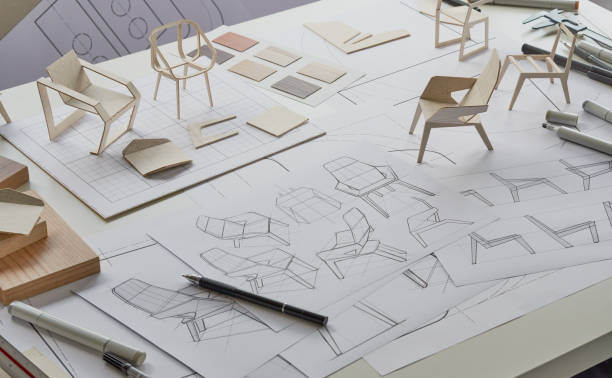 istock Designer sketching drawing design development product plan draft chair armchair Wingback Interior furniture prototype manufacturing production. designer studio concept . 1406509393