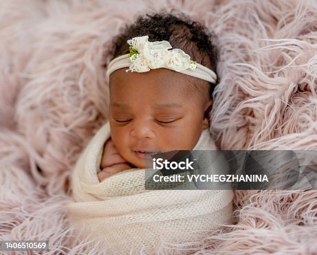 istock Baby girl with diadem 1406510569