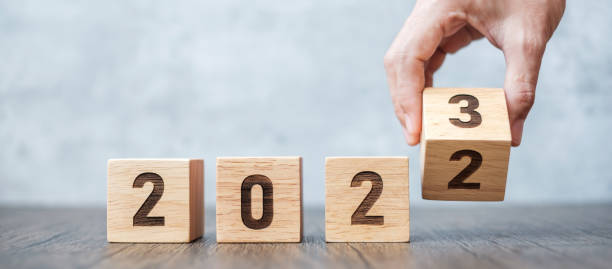 istock hand flip 2022 to 2023 block. goal, Resolution, strategy, plan,, motivation, reboot, forecast, change, countdown and New Year holiday concepts 1406518292