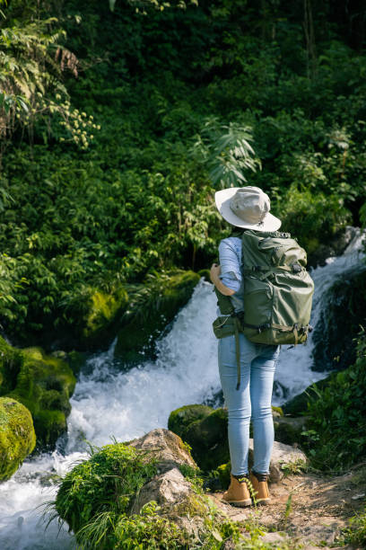 istock Young woman hiking in mountain 1406519436