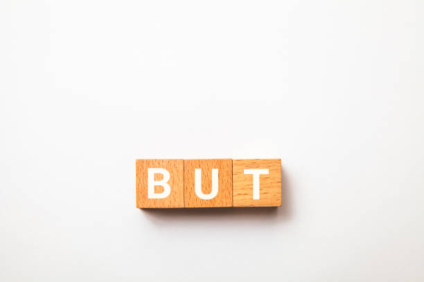 istock BUT character. However. Written on three wooden blocks. White letters. 1406519908
