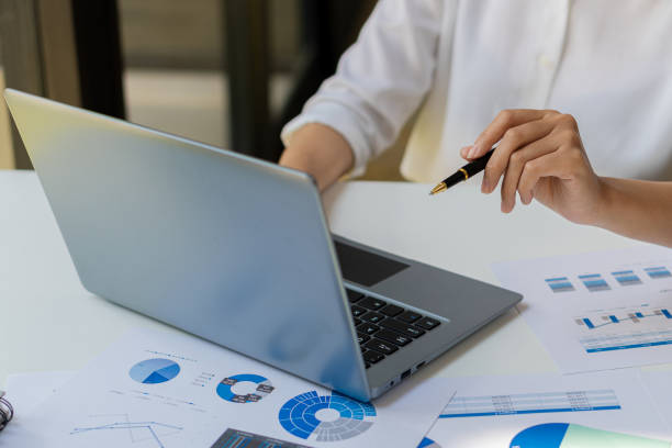 istock businessman hands working on laptop computer data analysis financial chart review online work concept 1406521350
