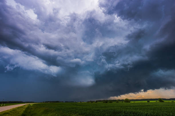 istock Storm clouds over field, tornadic supercell, extreme weather, dangerous storm 1406523674