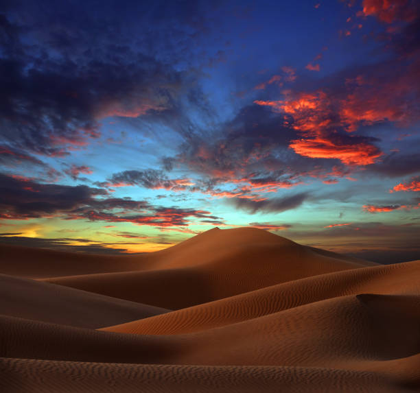 istock sand dunes in desert at sunset 1406528677