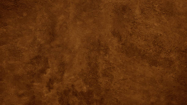 textura rugosa de color marrón oscuro. superficie de muro de hormigón tonificado. primer plano. fondo marrón con espacio para el diseño. - castaña fotografías e imágenes de stock