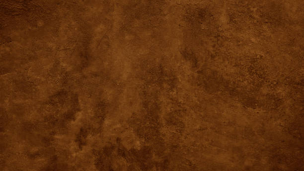 textura rugosa de color marrón oscuro. superficie de muro de hormigón tonificado. primer plano. fondo marrón con espacio para el diseño. - dark chestnut fotografías e imágenes de stock