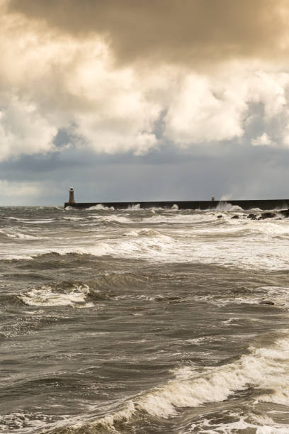 istock Rough seas on a cloudy day at Tynemouth, England 1406529546