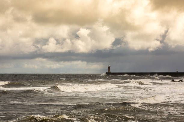 istock Rough seas on a cloudy day at Tynemouth, England 1406530250