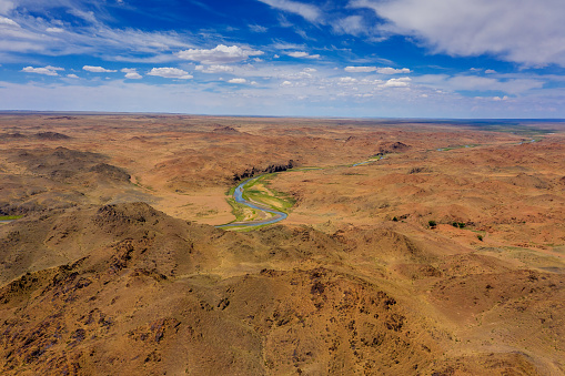 Aerial view of Ongiin Gol river between mountains in Mongolia