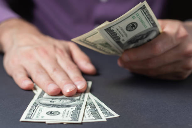 istock Man giving bribe to businessman. Corruption concept 1406537143