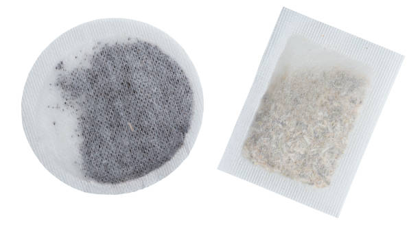 istock Tea bags isolated on white background, close up 1406537887