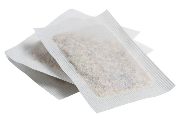 istock Tea bags isolated on white background, close up 1406538582