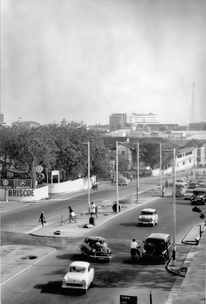 Traffic on Kwame Nkrumah Avenue in the centre of Accra, Ghana, taken in 1959 Accra, Ghana - July 1959: Traffic on Kwame Nkrumah Avenue in the centre of Accra, Ghana, taken in 1959 1950 1959 photos stock pictures, royalty-free photos & images