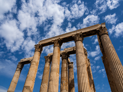 Remaining columns of Temple of Olympian Zeus in Athens, Greece, blue sky and clouds.