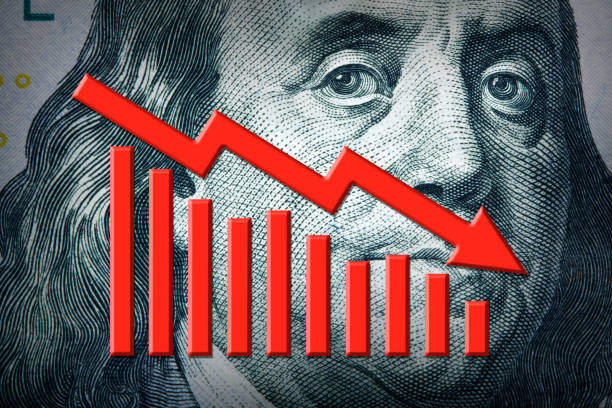 istock Declining Chart On Face Of One Hundred Dollar Bill 1406550514