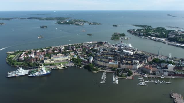 Katajanokka area in Helsinki, Finland. Beautiful Cityscape with Harbour and Sea in Background. Drone Point of View.