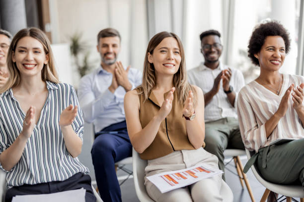 istock Business Audience Applauding to Speaker after Conference 1406551676