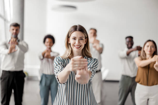 istock Business People Exercising in Office 1406552067