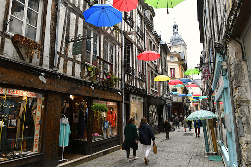 Rouen, France-06 30 2022:People walking in an old medieval street in Rouen, France.