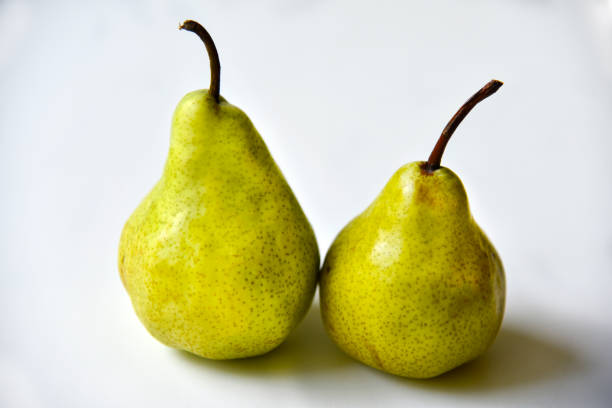 istock Green delicious pear on a white background 1406555976