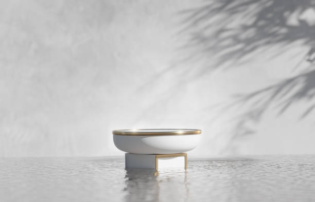 istock 3D podium, white display with gold. Copy space white background. Cosmetics or beauty product promotion mockup. Luxury step pedestal on water. Trendy minimalist banner advert, 3D render illustration 1406559747