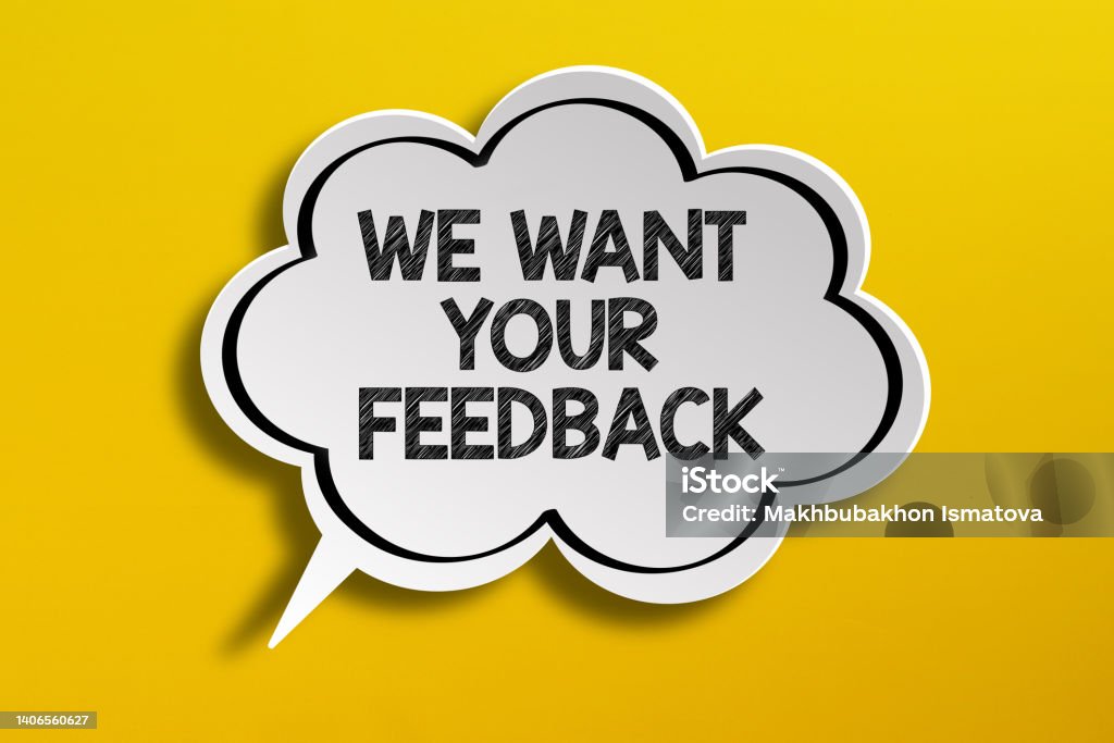 We Want Your Feedback written in speech bubble on yellow background Desire Stock Photo