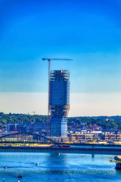 Belgrade tower under construction in Belgrade, Serbia. Belgrade, Serbia, September 11 2021: Belgrade tower under construction in Belgrade, Serbia. panoramic riverbank architecture construction site stock pictures, royalty-free photos & images