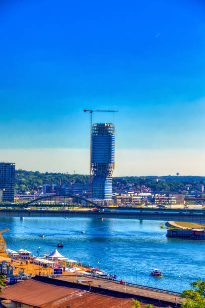 Belgrade tower under construction in Belgrade, Serbia. Belgrade, Serbia, September 11 2021: Belgrade tower under construction in Belgrade, Serbia. panoramic riverbank architecture construction site stock pictures, royalty-free photos & images